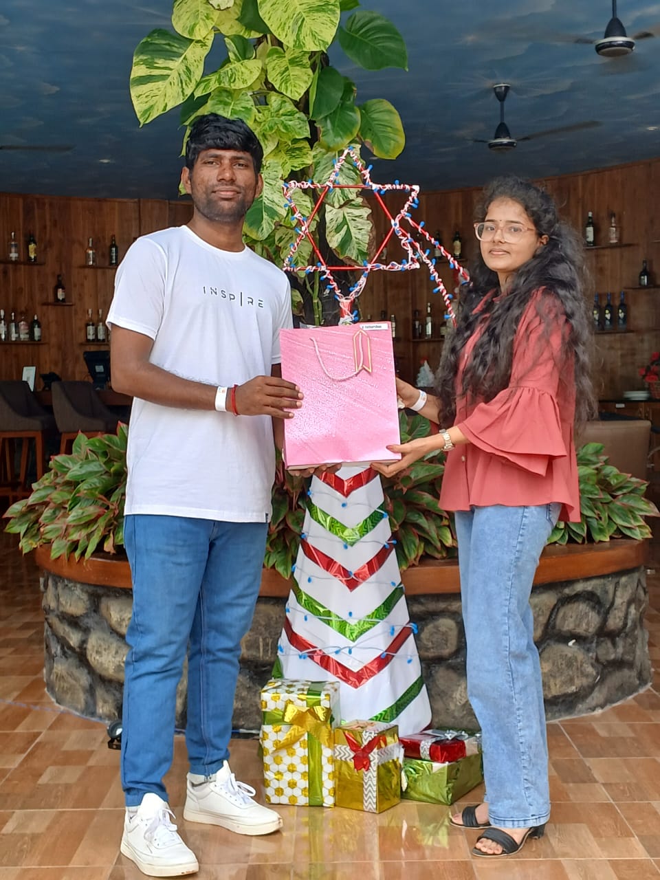 Giving a gift as HR manager at the 2025 QTechy year end celebration